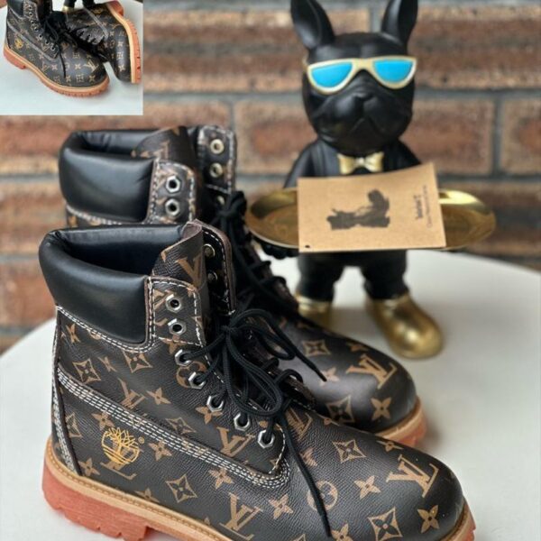 Black Monogram Embossed Leather Boots