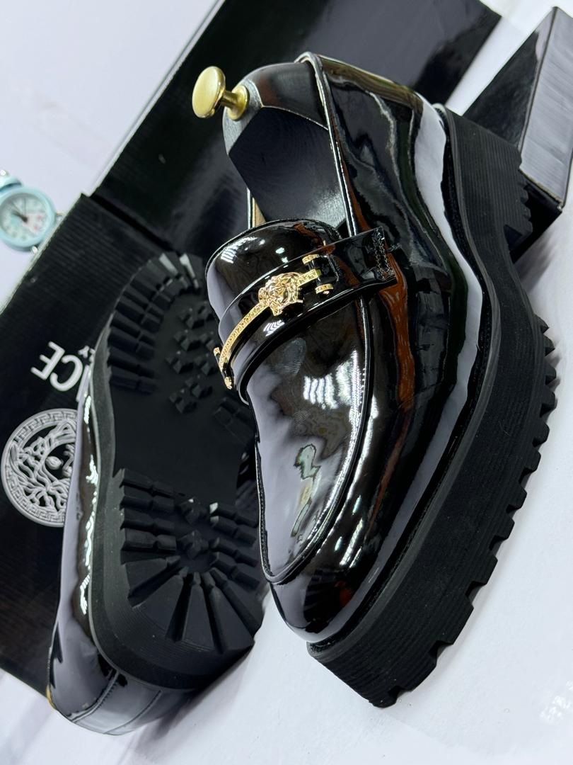 Black Patent Leather Platform Loafers with Gold Medusa Emblem Black Patent Leather Platform Loafers with Gold Medusa Emblem