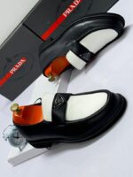 Black & White Leather Loafers with Metal Logo Plaque