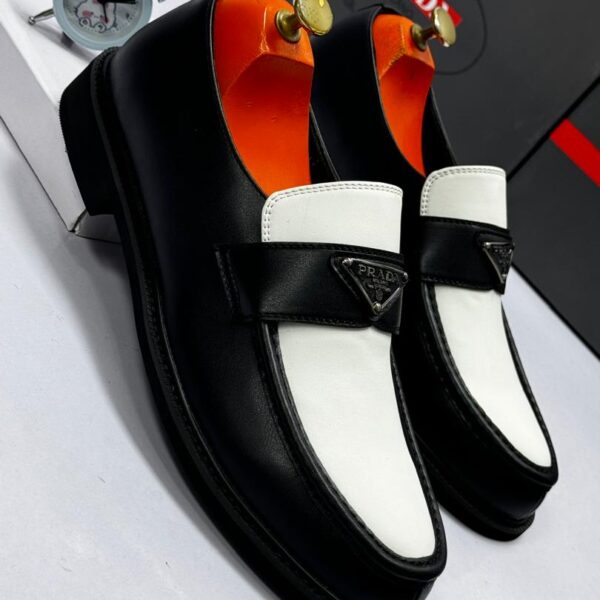 Black & White Leather Loafers with Metal Logo Plaque