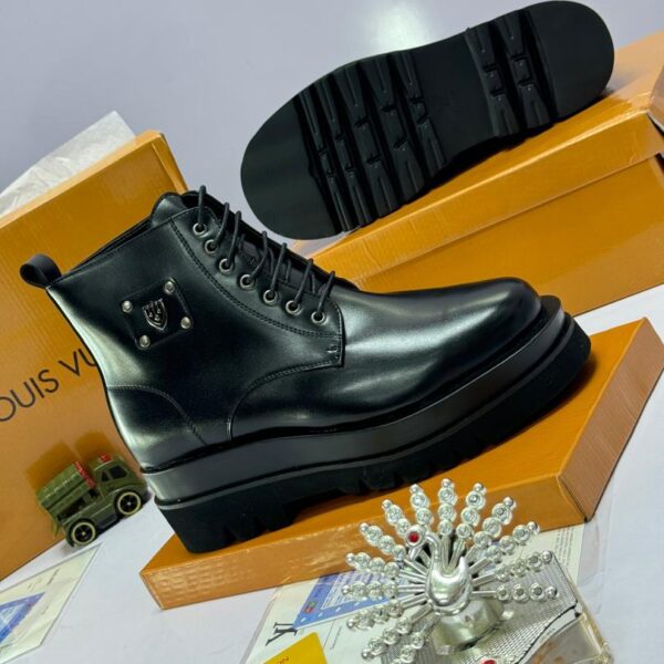 Luxury Designer Boots with Metallic Side Emblem