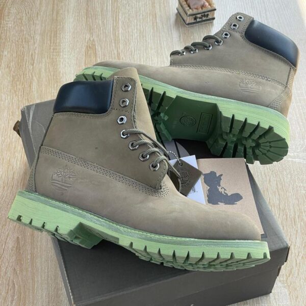 Rugged Leather Boots with Distinct Green Sole