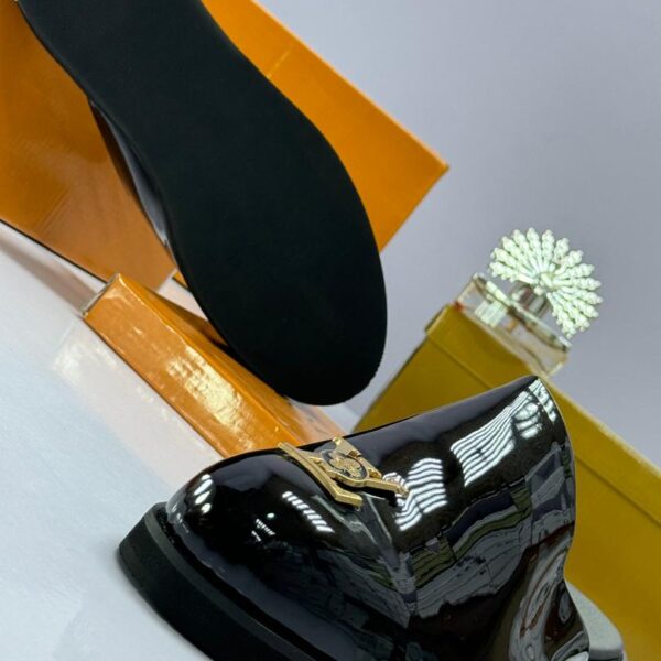 Black Patent Leather Mules with Gold-Tone Emblem
